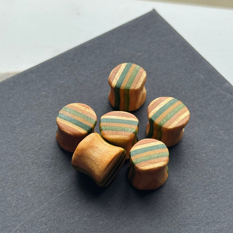Handmade recycled skateboard Green & Natural Plugs – 10mm — Baltic Dew, made in the UK