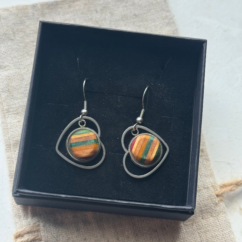 Handmade recycled skateboard Green & Yellow Heart Drop Earrings — Baltic Dew, made in the UK