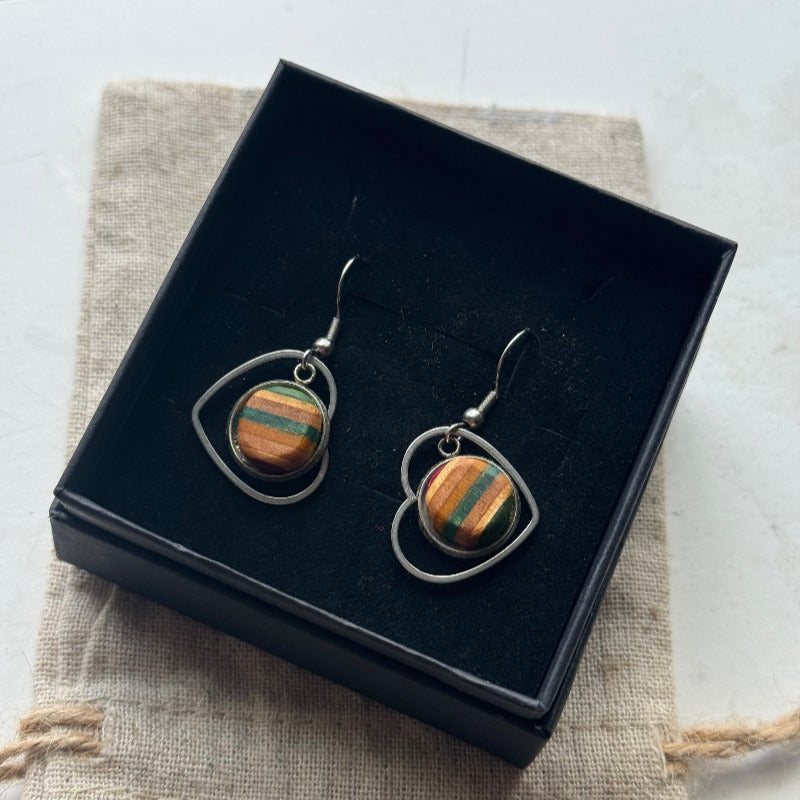 Handmade recycled skateboard Green & Yellow Heart Drop Earrings — Baltic Dew, made in the UK