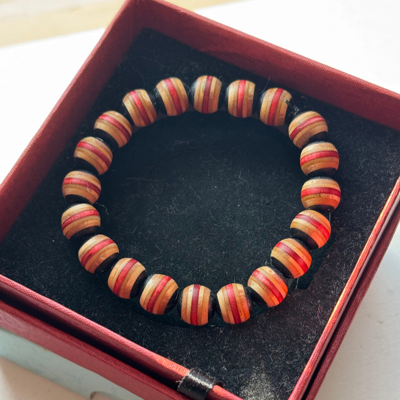 Handmade recycled skateboard Red & Black Stripe Bead Bracelet — Baltic Dew, made in the UK