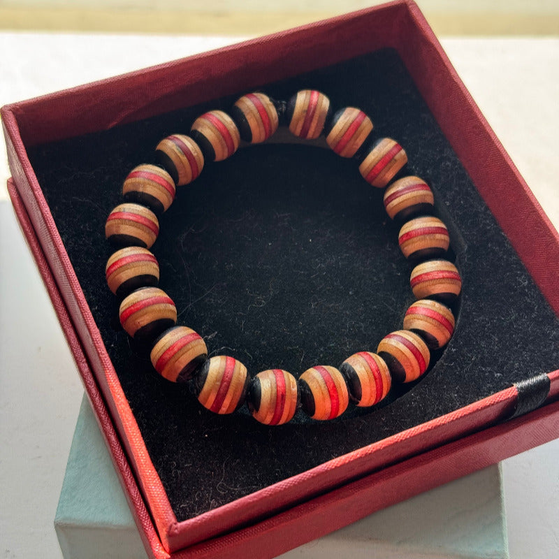 Handmade recycled skateboard Red & Black Stripe Bead Bracelet — Baltic Dew, made in the UK