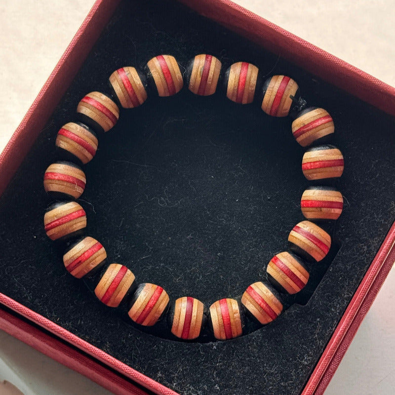 Handmade recycled skateboard Red & Black Stripe Bead Bracelet — Baltic Dew, made in the UK