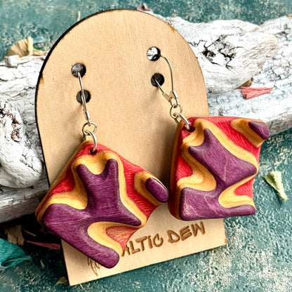 Chunky carved skateboard wood earrings in purple and red on sterling silver hooks