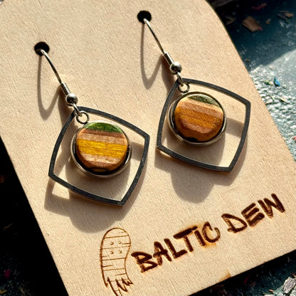 Wooden drop earrings with yellow and green skateboard colour layers in open square frames.