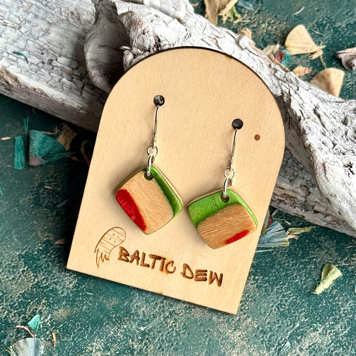 Rounded square recycled skateboard wood earrings in green and red on surgical steel hooks