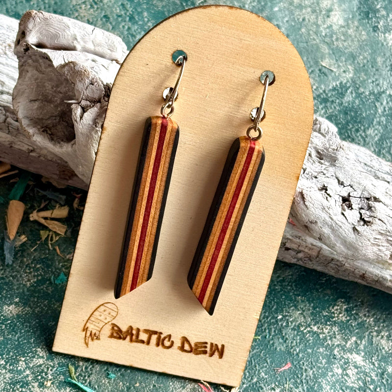 Black and red recycled skateboard long drop earrings with cream stripes down the slim bars