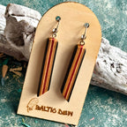 Black and red recycled skateboard long drop earrings with cream stripes down the slim bars