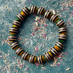 Black, yellow and green recycled skateboard maple bracelet on elastic stretch cord.