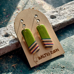 Green recycled skateboard rectangle drop earrings displayed on a Baltic Dew wooden earring card.