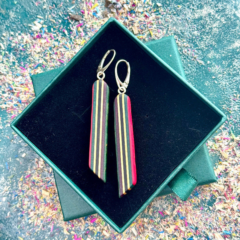 Recycled skateboard long drop earrings with striped layered maple and sterling silver leverback hooks.
