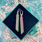 Recycled skateboard long drop earrings with striped layered maple and sterling silver leverback hooks.