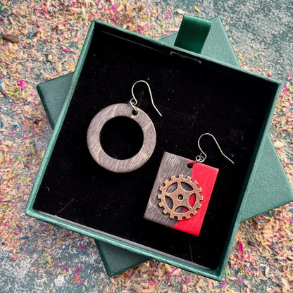 A multicolour layered ring made from recycled skateboard wood with glossy CA glue finish, handmade by Baltic Dew