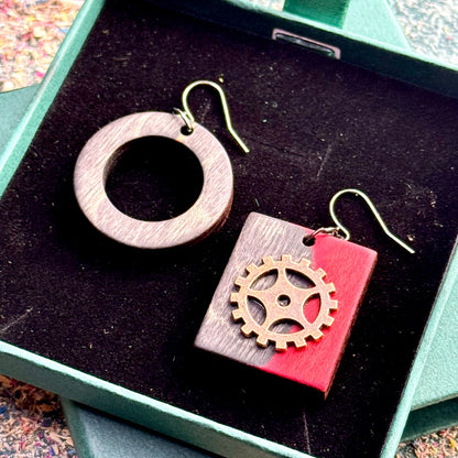 A multicolour layered ring made from recycled skateboard wood with glossy CA glue finish, handmade by Baltic Dew