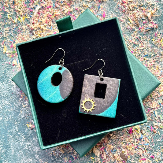 Handmade recycled skateboard Black and Teal Asymmetrical Skateboard Earrings — Baltic Dew, made in the UK
