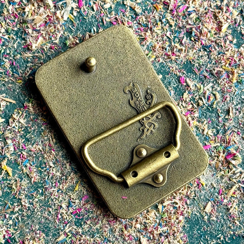 belt buckle, A multicolour layered jewellery piece made from recycled skateboard wood, handmade by Baltic Dew with.