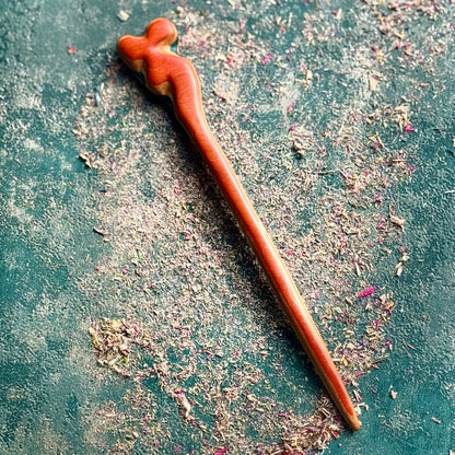 A multicolour layered hair stick made from recycled skateboard wood with oiled wooden finish, handmade by Baltic Dew