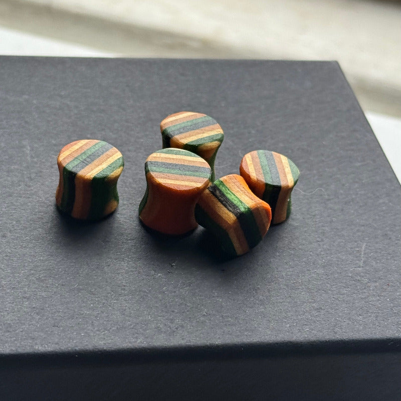 Handmade recycled skateboard Green & Black Striped Ear Plugs – 10mm — Baltic Dew, made in the UK