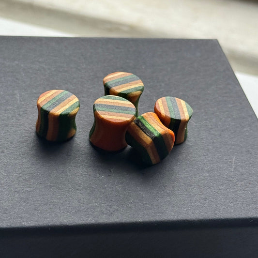 Handmade recycled skateboard Green & Black Striped Ear Plugs – 10mm — Baltic Dew, made in the UK