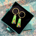 Green layered wood hoop earrings with black stainless steel hoops.
