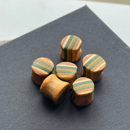 Handmade recycled skateboard Green & Natural Plugs – 10mm — Baltic Dew, made in the UK