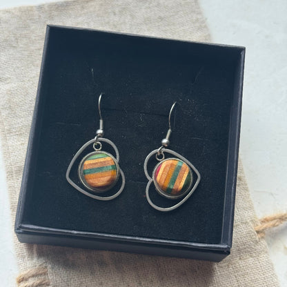 Handmade recycled skateboard Green & Yellow Heart Drop Earrings — Baltic Dew, made in the UK
