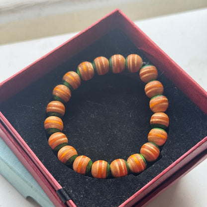 Handmade recycled skateboard Green & Yellow Stripe Bead Bracelet — Baltic Dew, made in the UK