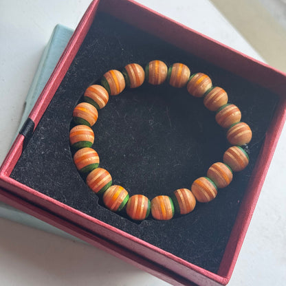 Handmade recycled skateboard Green & Yellow Stripe Bead Bracelet — Baltic Dew, made in the UK
