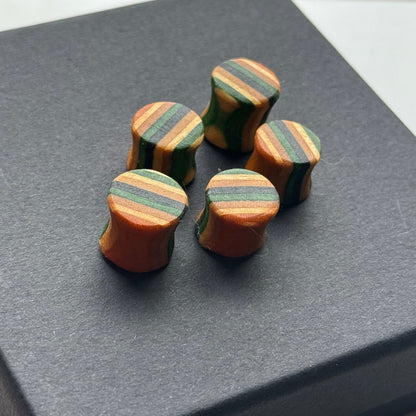Handmade recycled skateboard Green & Black Striped Ear Plugs – 10mm — Baltic Dew, made in the UK