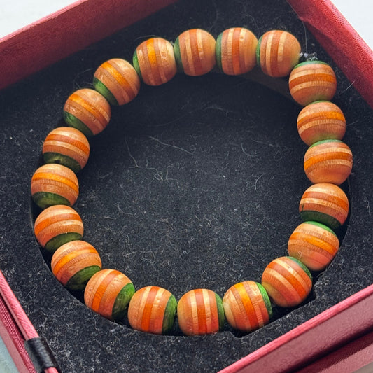 Handmade recycled skateboard Green & Yellow Stripe Bead Bracelet — Baltic Dew, made in the UK