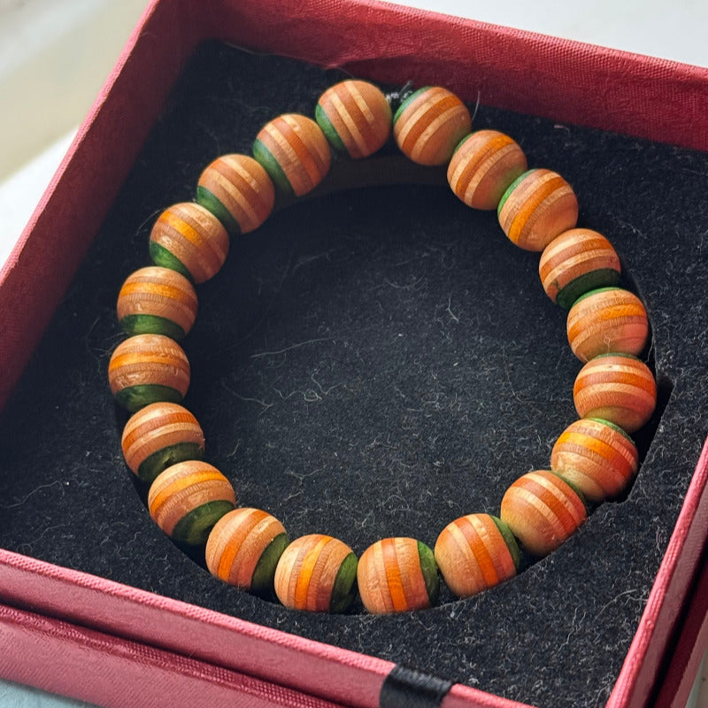 Handmade recycled skateboard Green & Yellow Stripe Bead Bracelet — Baltic Dew, made in the UK