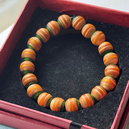 Handmade recycled skateboard Green & Yellow Stripe Bead Bracelet — Baltic Dew, made in the UK