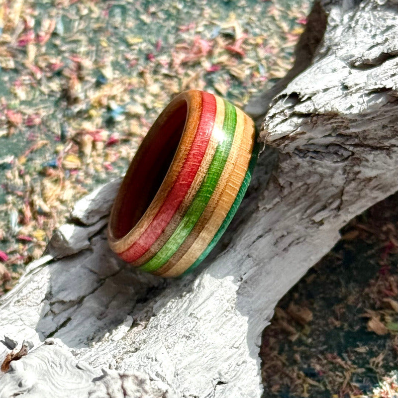 Skateboard maple ring with visible orange, red and green stripes.